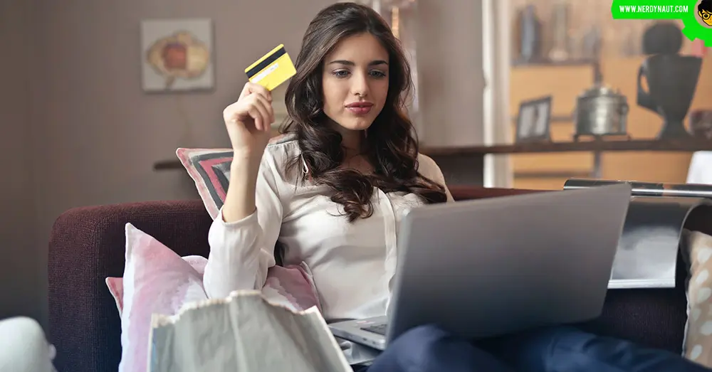A woman using credit card for online payment
