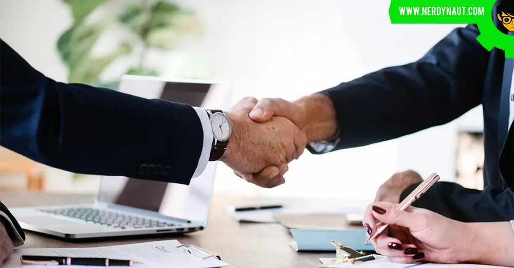 How to Make an Impression on Potential Clients - Handshake two men