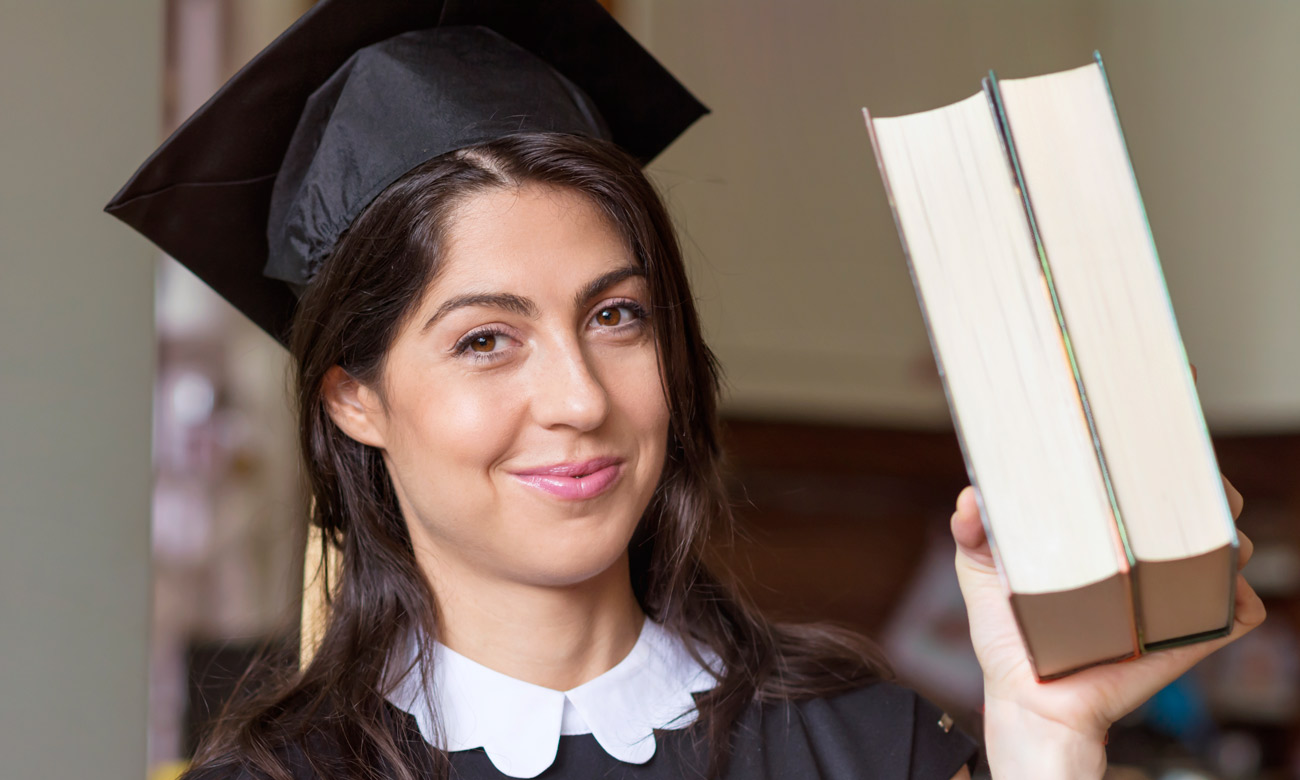 graduated girl with two books