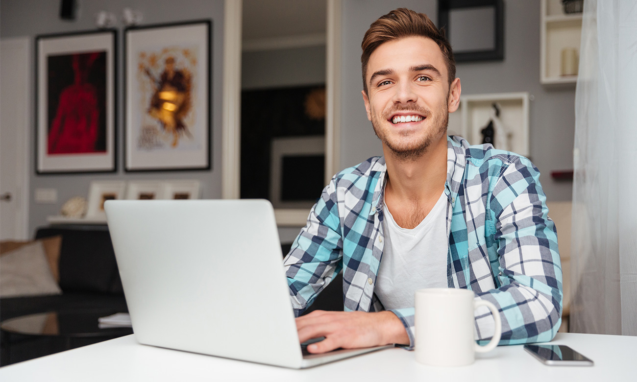 Young man using laptop