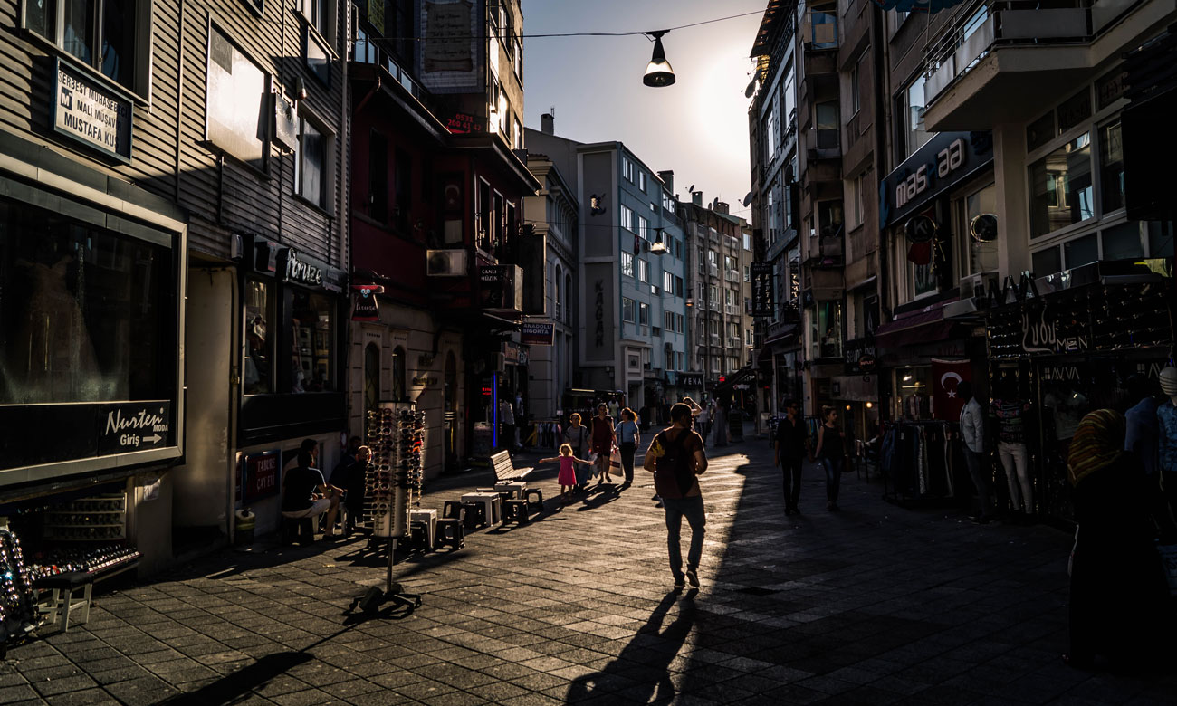 A Man Walking at a Market