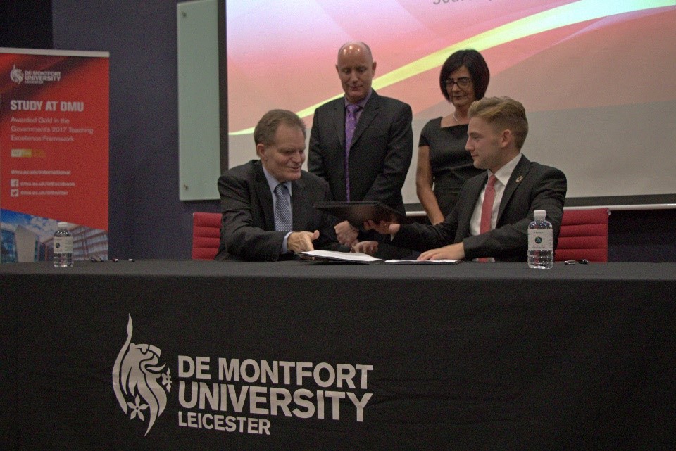 Prof. Ron Edwards, Vice Chancellor, APU (seated, left) exchanges the Partnership Agreement with James Gardner,