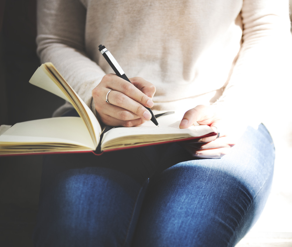 woman doing paper work for moving