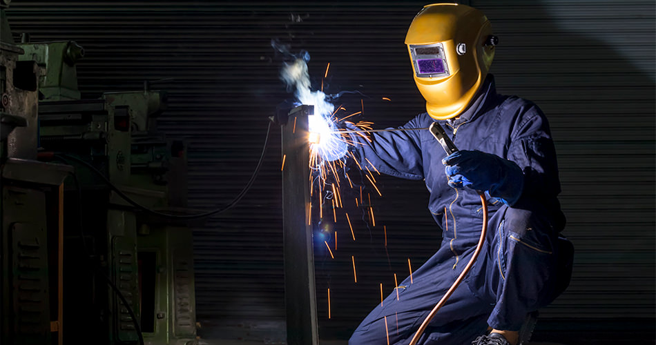 Welder while welding