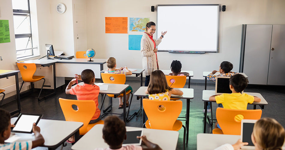 School kids and teacher in class