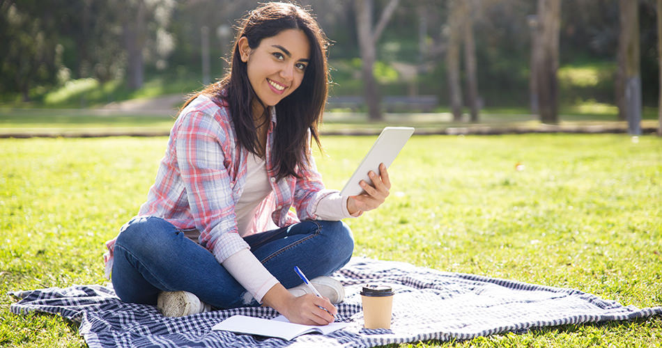 girl study at on grass