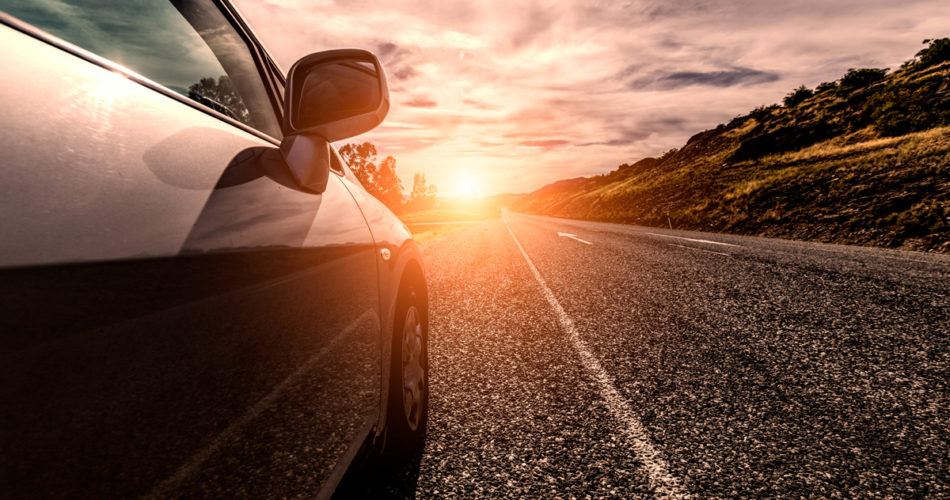 Car and sun light on the road