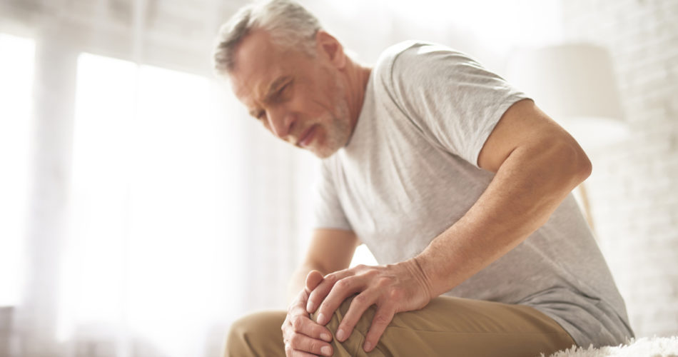 an elderly man with arthritis